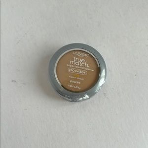 L'Oreal Tan Setting Spray for a Radiant Glow